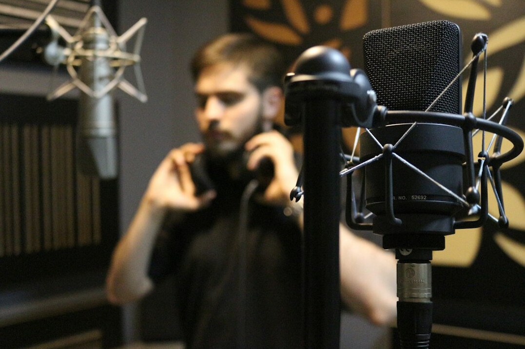 singer recording in studio