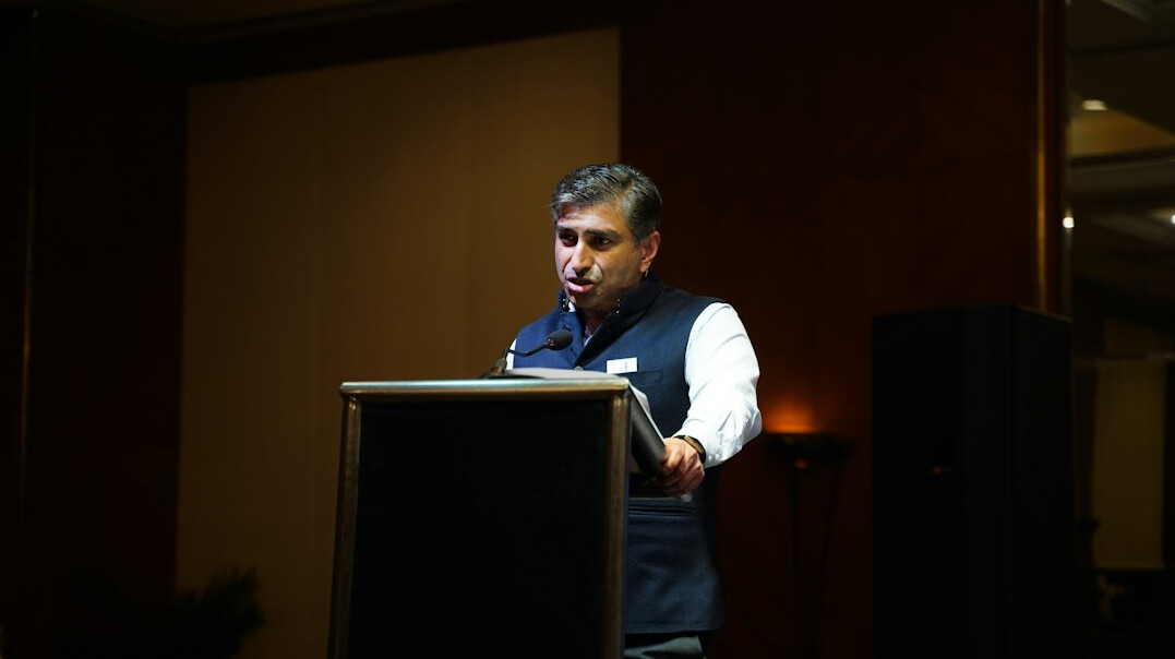 politician speaking at event