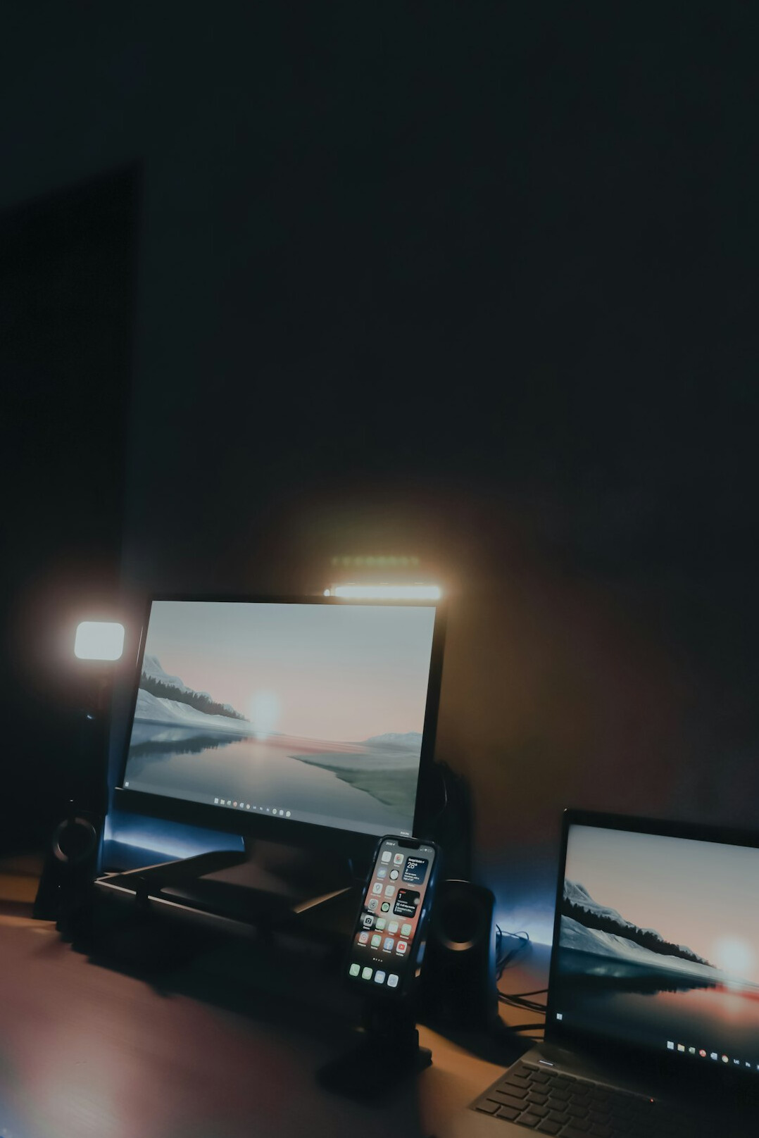 Newsroom desk with monitors and notes