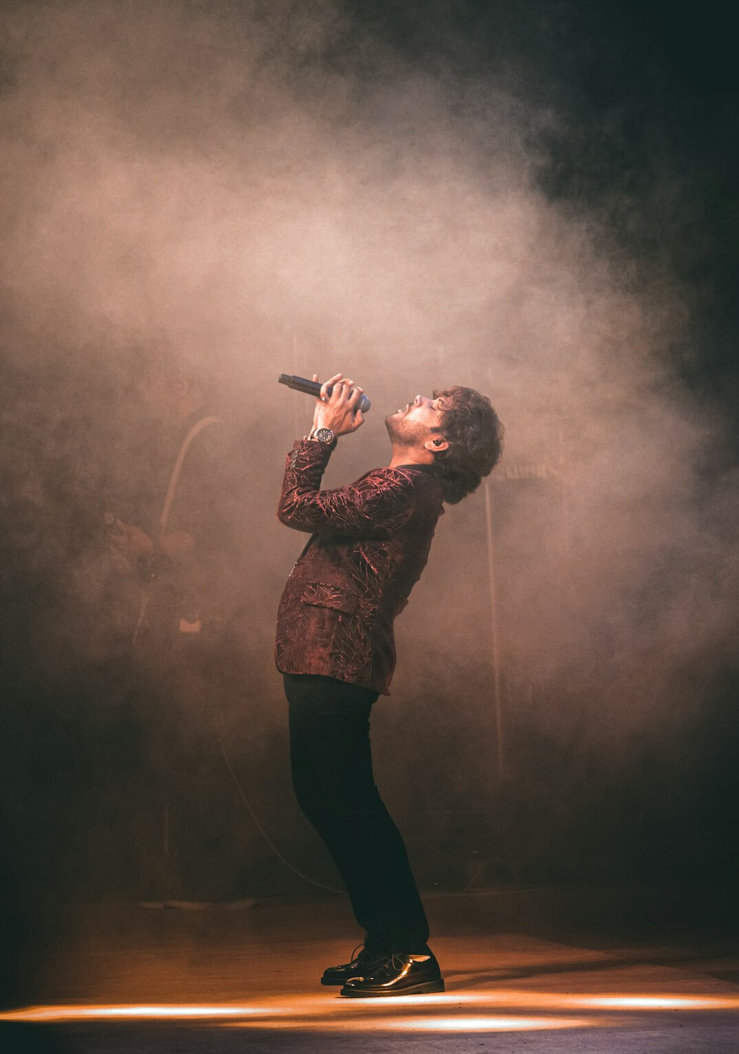 singer on stage performing